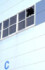 岩手県沖を震源とする地震で割れた工場の窓ガラス＝２５日午前、青森県八戸市
