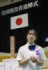 全国戦没者追悼式を前に、取材に応じる青少年献花者の金井里紗さん＝１５日午前、東京都千代田区