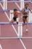 女子100メートル障害予選　障害を超える田中（撮影・宮地輝）