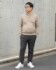 ダサい人のニットの着方（画像はAIで生成したものです）